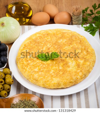 Spanish tortilla (omelette) and some ingredients. By far the most popular Spanish tapa