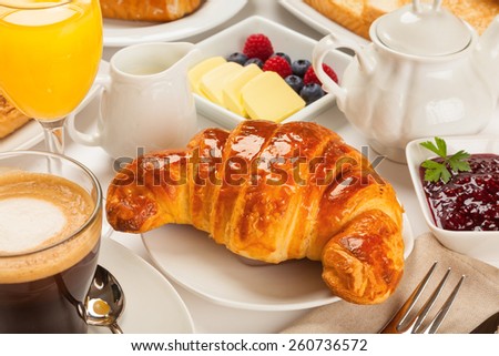 Continental breakfast with croissants, orange juice and coffee or tea