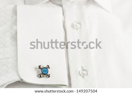 Cuff link on formal white shirt