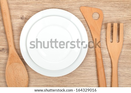 Kitchen utensils on wooden table