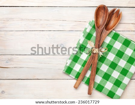 Kitchen utensil over white wooden table background. View from above with copy space