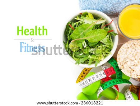Dumbells, tape measure, healthy food and towels. Fitness and health. Isolated on white background