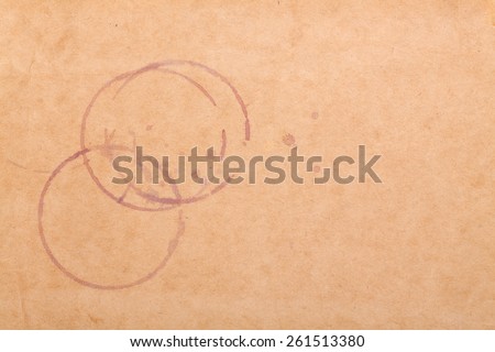 Wine stains on brown paper background with copy space