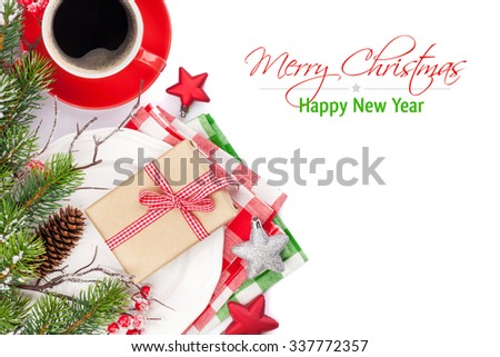 Christmas table setting with gift box and fir tree. Top view with copy space