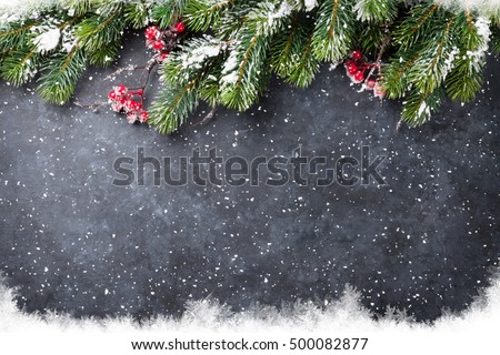 Christmas stone background with snow fir tree. Top view with copy space