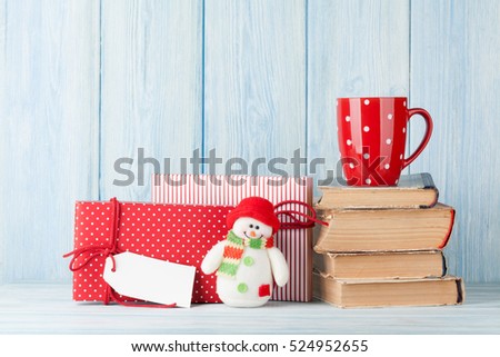 Hot chocolate cup and christmas gift boxes. View with copy space