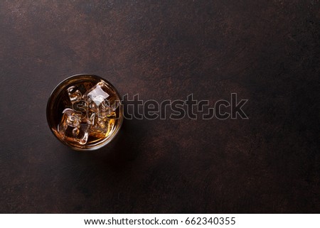 Whiskey with ice. Top view with copy space