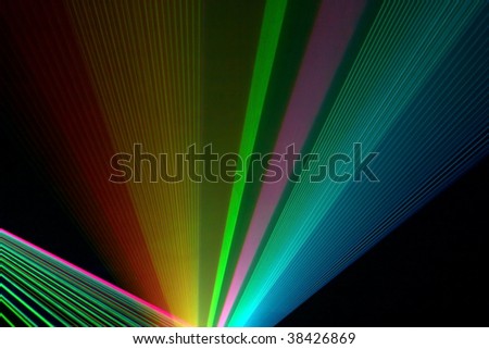 Color laser beams fantail in a haze