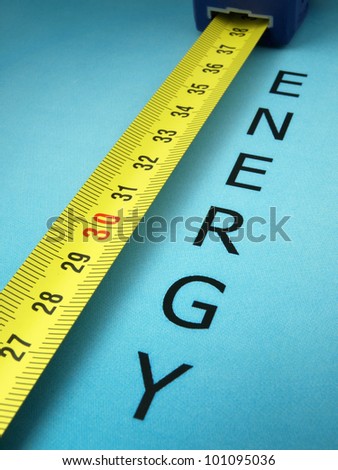A metal ruler to measure the words and their growth