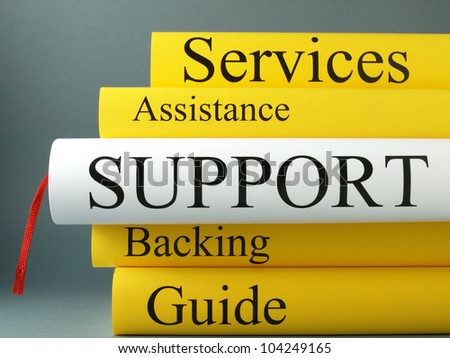 Stack of technical support and books Stack of technical support and books
