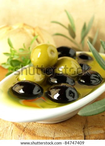 Olives, olive oil and one mediterranean diet in a bowl