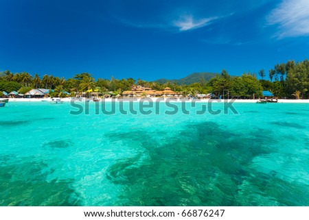 A paradise with perfect crystal clear ocean water and pure white sand beach on Ko Lipe, Thailand