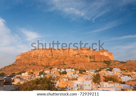 Blue residential houses at the base of Mehrangarh Fort in Jodhpur, Rajasthan.  Large area for copy space.
