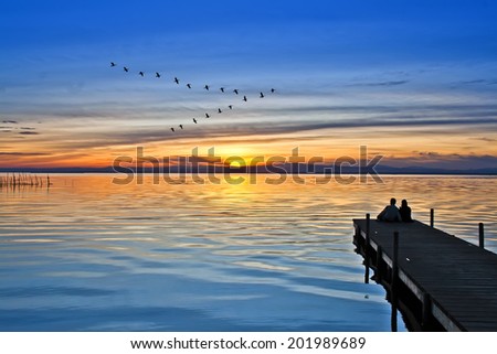 People on the pier watching the sun rise,HDRi