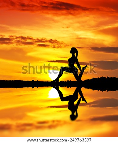 woman playing sports on the lake
