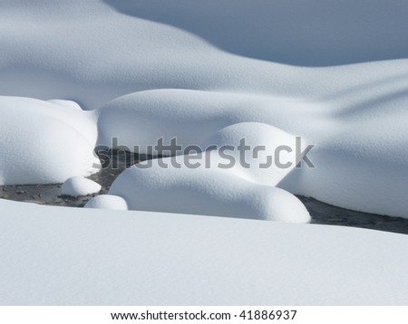Cold winter scene with snow and water