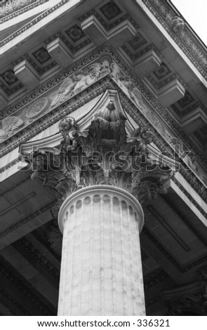 Low angle view of the top of an ornate column, Paris, France (black and white),