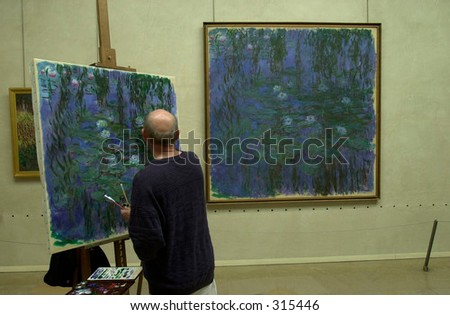 Rear view of a man painting in a room, Paris, France,