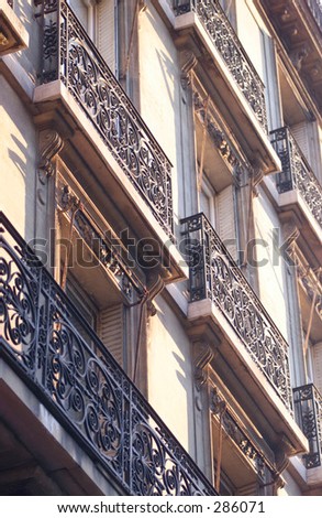 Low angle view of an array of wrought iron balconies, Paris, France, July 2001 (Keith Levit)