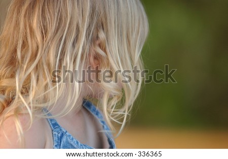 Young girl looking back,