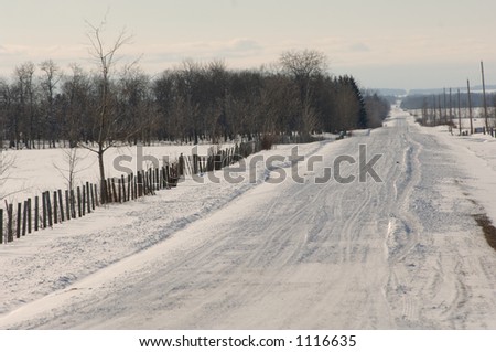 Snow covered road in Alberta Canada