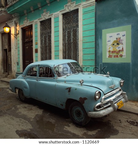 Antique car parked outside a building, Havana, Cuba