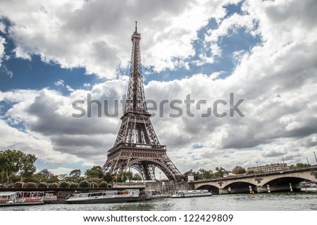 PARIS - AUGUST 28: Eiffel Tower on August 28, 2012, in Paris. The Eiffel Tower is the most visited tourist attraction in France and one of the most recognizable landmarks in the world.