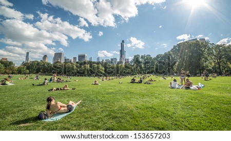 NEW YORK - SEPTEMBER 9: summertime in Central Park on September 9, 2013 in New York. Central Park is a public park at the center of Manhattan, which opened in 1857, on 778 acres of city-owned land.