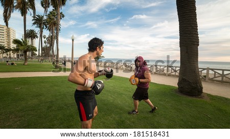 SANTA MONICA - MARCH 9: boxer at the beach on March 9, 2014 in Santa Monica. Santa Monica is a beachfront city in western Los Angeles County, California, United States.