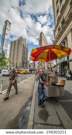 NEW YORK - JUNE 6: hot dog cart on June 6, 2014 in New York. The U.S. Hot Dog Council estimates that 15% of the 10 billion hot dogs consumed by Americans in 2013 were purchased from a hot dog cart.