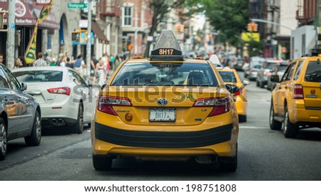 NEW YORK - JUNE 14: taxicab on June 14, 2014 in New York. Canary yellow in color, medallion taxis are able to pick up passengers anywhere in the five boroughs.
