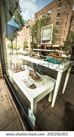 NEW YORK - JUNE 22: store window in Greenwich Village on June 22, 2014 in New York. Greenwich Village, also knows as \