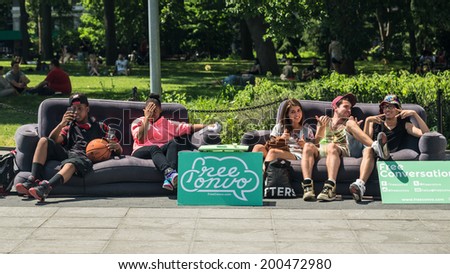 NEW YORK - JUNE 16: kids in Washington Square Park on June 16, 2014 in New York. Washington Square Park is one of the best-known of New York City\'s 1,900 public parks.