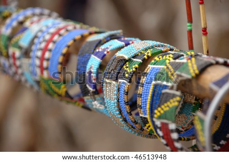 Bracelets shown for sale in local village Massai market , Serengeti, Tanzania