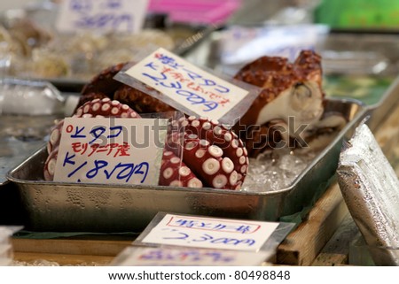 TOKYO- JULY 4: Fresh octopus on sale at the Tsukiji Wholesale Seafood and Fish Market in Tokyo Japan on July 4, 2011. Tsukiji Market is the biggest wholesale fish and seafood market in the world.