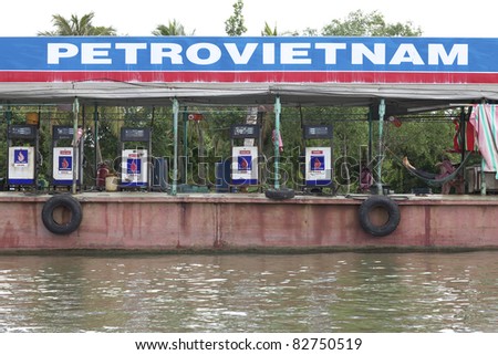 CAN THO, VIETNAM- MAY 28: A PetroVietnam floating fuel station barge on the Mekong Delta in Can Tho, Vietnam on May 28, 2011.  Established in 1977, PetroVietnam is Vietnam\'s largest oil producer.
