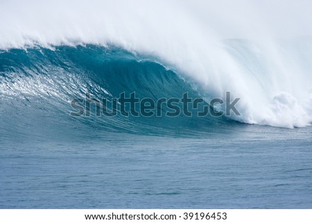 big blue hollow wave with offshore wind breaking on the desert west coast of australia