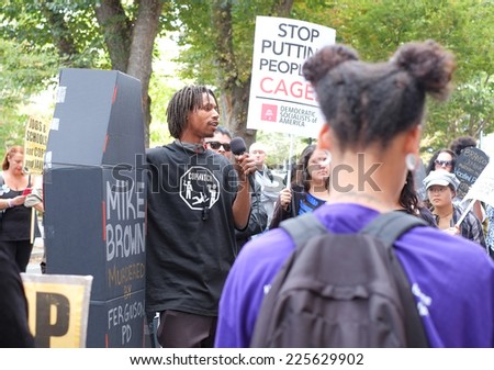SACRAMENTO, CALIFORNIA - October 22: Protesters gather at the State Capital Building to demonstrate against police brutality in Sacramento, California on October 22, 2014