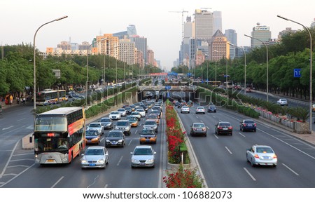 BEIJING-MAY 15: Traffic flow on East Third Ring Road on May 15, 2012 in Beijings Central Business District, China. The third Ring Road is a (around 48 km) ring road that encircles Beijing downtown.