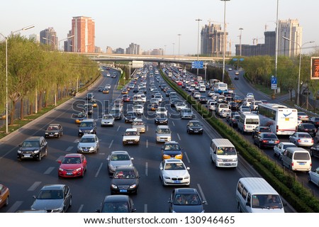 BEIJING-APR 14: Traffic jam on Apr.14, 2011 in Beijing,China. The Beijing municipal government has the controlling traffic jams at the top of the to-do list to benefit people in 2013