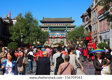 BEIJING-OCT 2: Visitors enjoy the sightseeing at the famous Qianmen Street during National Day holiday on Oct. 2,2013 in Beijing, China. China\'s celebrates 64th anniversary of founding