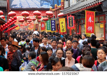 Beijing - Oct 4: People Crowd Famous Wangfujing Snack Street During National Day Holiday On Oct. 4, 2013 In Beijing, China. China\'S Celebrates 64th Anniversary Of Founding