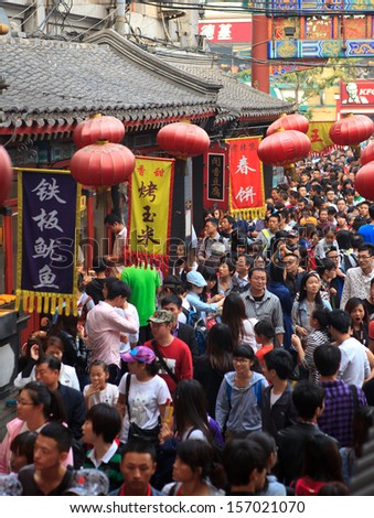 Beijing - Oct 4: People Crowd Famous Wangfujing Snack Street During National Day Holiday On Oct. 4, 2013 In Beijing, China. China\'S Celebrates 64th Anniversary Of Founding