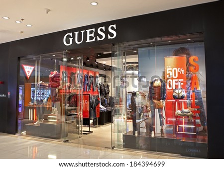 BEIJING, CHINA - JANUARY 5, 2014: GUESS store;   GUESS is an American upscale clothing line brand that also markets other fashion accessories besides clothes, such as watches, jewelry and perfumes.