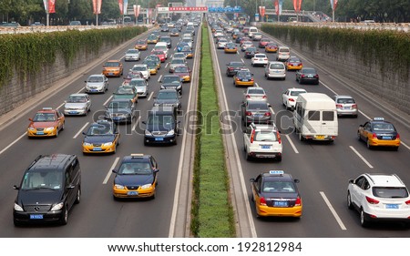 BEIJING, CHINA - SEPTEMBER. 9, 2013: Traffic jam at East third ring road; China\'s vehicle sales increased 8.8 percent year-on-year in April. China sold 2 million vehicles in the month in total.