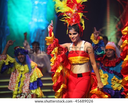 BEIJING - JANUARY 31: Dancers wearing colored outfit perform on stage during Indian Music and Dance Show at Beijing Exhibition Theater on January 31, 2010 in Beijing, China.