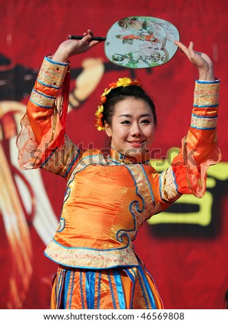 BEIJING - FEBRUARY 13: A dancer performs during the Spring Festival Temple Fair at Ditan Park on February 13, 2010 in Beijing, China, for the celebrations of the Chinese New Year.