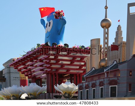 BEIJING - OCTOBER 3: Shanghai World Expo 2010 mascot Haibao and replicas of Shanghai landmarks are on display during China's 60th anniversary at Tiananmen Square on October 3, 2009, in Beijing, China.