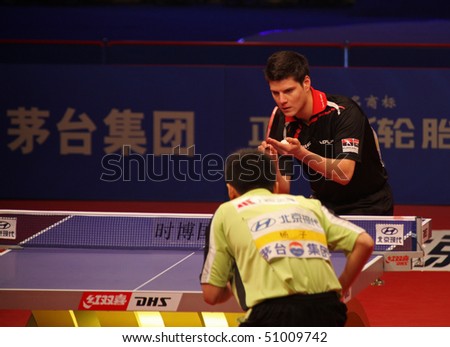 BEIJING - APRIL 15: Dimitrij Ovtcharov (GER) during match against YANG Zi (SIN) at the HYUNDAI Asia-Europe All Stars Series event day2 on April 15, 2010 in Beijing, China.