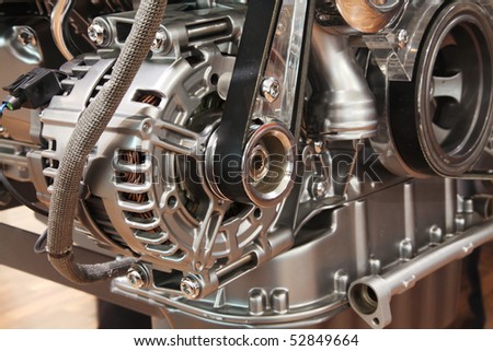 Closeup of a car alternator, component of car electrical system